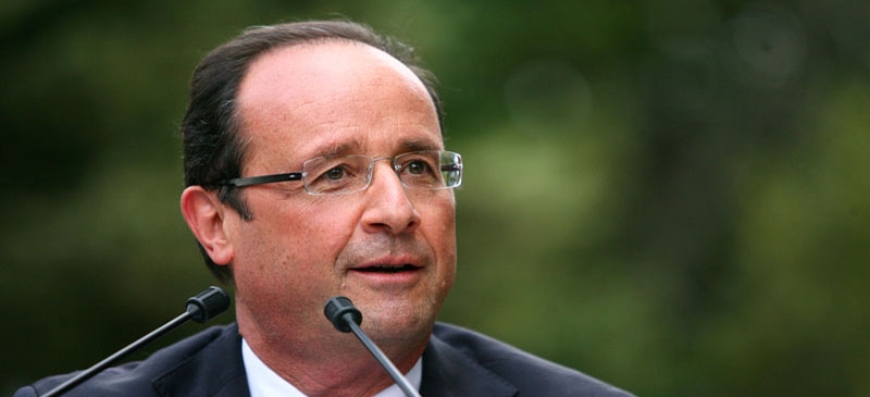 Hollande warns France of tough spending cuts